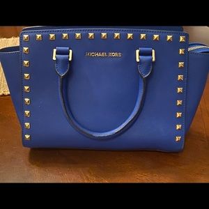 Cleaning out the closet. Used Michael Kors bag.